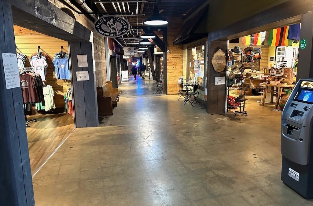 Photo of interior of McCaysville Mall with open shops on either side of the central mall corridor